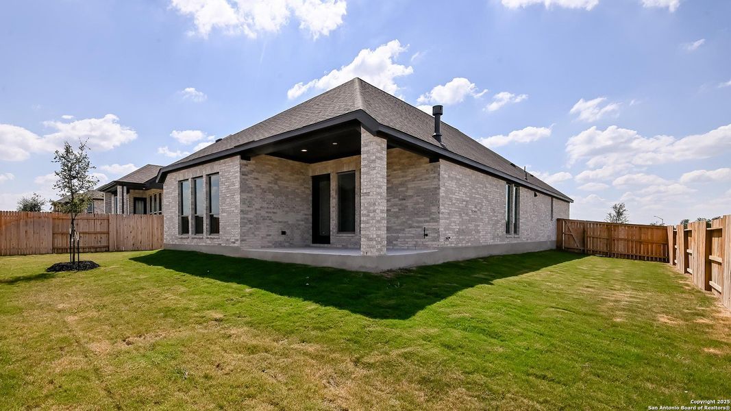 Exterior details and patio area of a home in Homestead 55', Cibolo (Image 3).