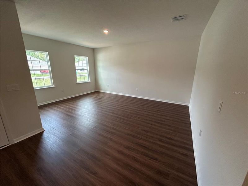 Primary bedroom with tray ceiling