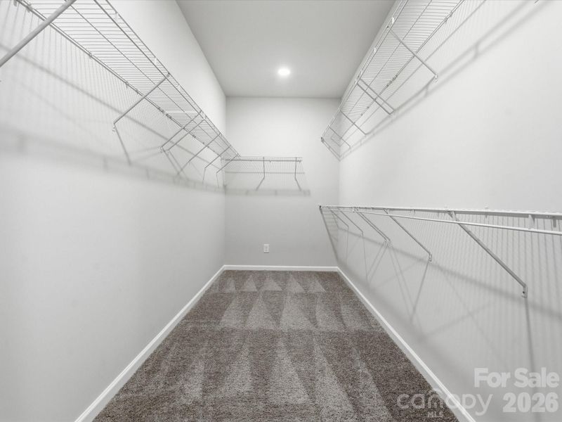 1 of 2 walk-in primary closets!