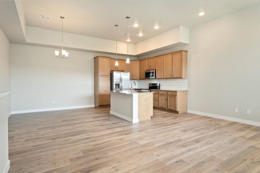 Furnished interior view inside a new home in The Lakes at Centerra, Loveland (Image 13).