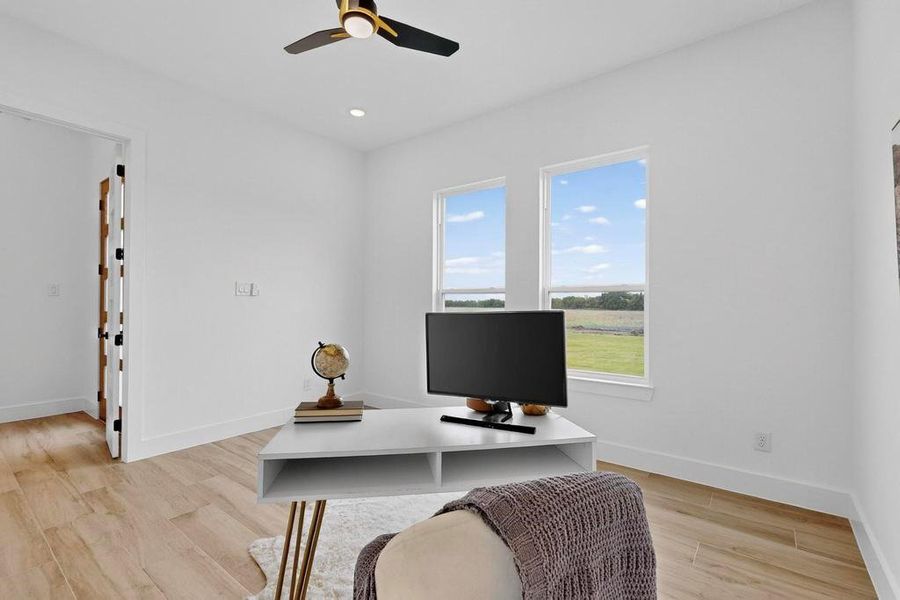 Office with light wood-style floors, recessed lighting, and a ceiling fan Office with light wood-style floors, recessed lighting, and a ceiling fan