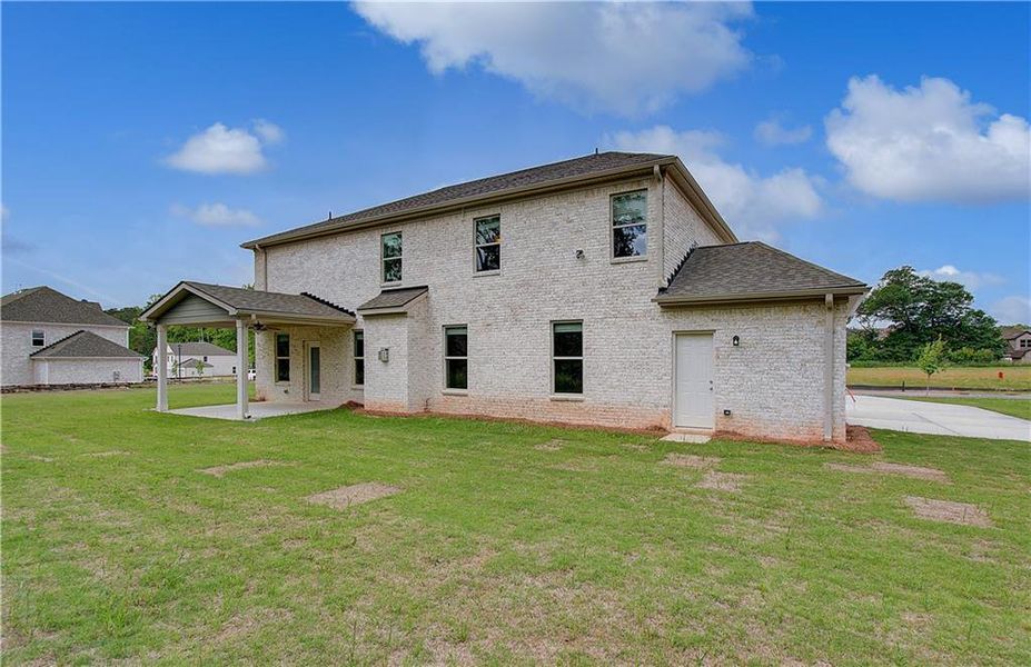 Exterior details and patio area of a home in Cambria at Traditions, Hampton (Image 16).