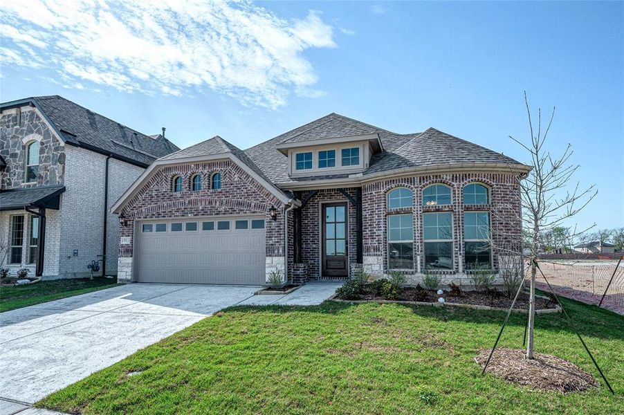 Front exterior of a new home in Meadow Vista, Anna, TX, highlighting curb appeal (Image 18).
