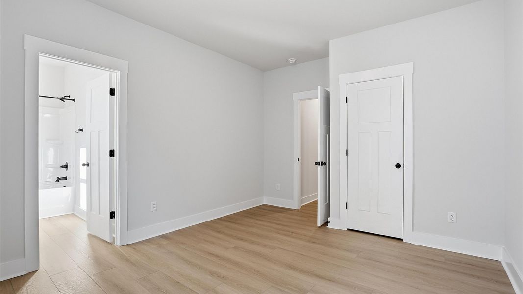 First-rate secondary bedroom with a spacious walk-in closet and elegant hardwood flooring located in Woodruff, SC First-rate secondary bedroom with a spacious walk-in closet and elegant hardwood flooring located in Woodruff, SC