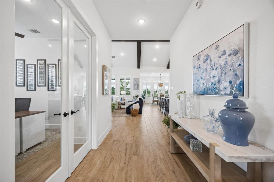 Double glass door at the front office space adds privacy and light while maintaining an open feel.