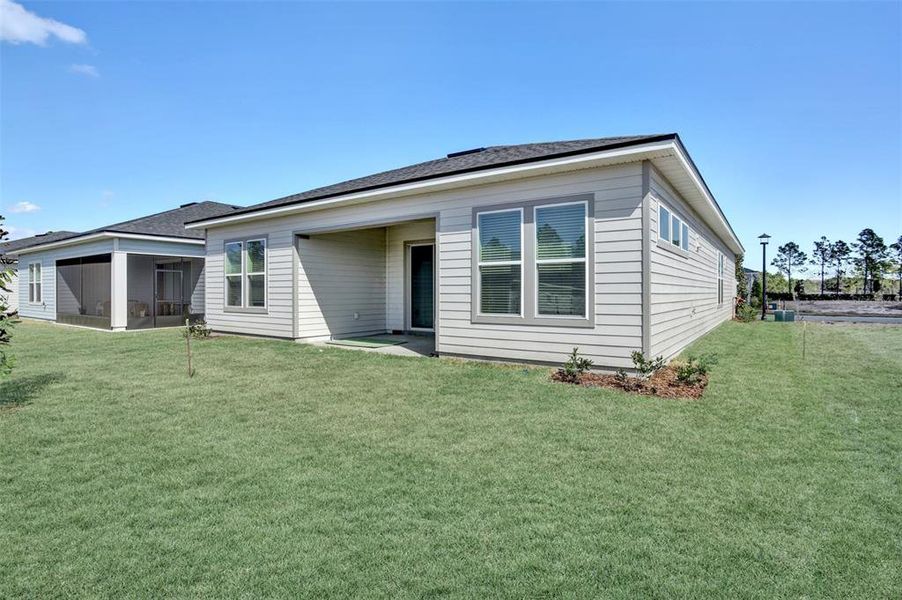 Exterior details and patio area of a home in , Palm Coast (Image 3). Exterior details and patio area of a home in , Palm Coast (Image 3).