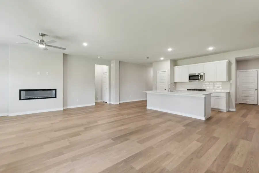 Open Floorplan in the Heisman home plan by Trophy Signature Homes – REPRESENTATIVE PHOTO
