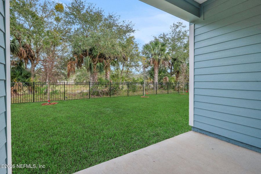 Exterior details and patio area of a home in The Hammock at Palm Harbor, Palm Coast (Image 22).