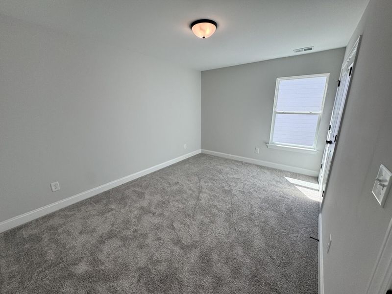 Spacious, unfurnished interior of a new home in Caldwell Forest, Charlotte (Image 20).