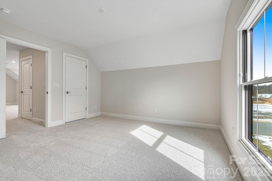 Spacious, unfurnished interior of a new home in The Courtyards at Lake Davidson, Mooresville (Image 26).
