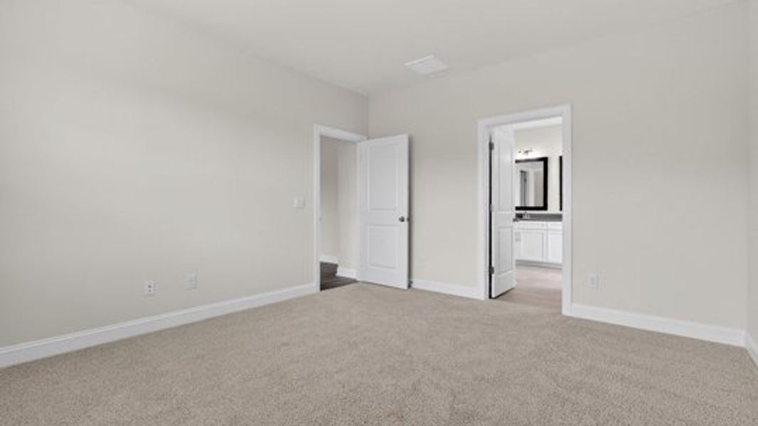 Spacious, unfurnished interior of a new home in The Manors at Haywood Glen, Knightdale (Image 14).