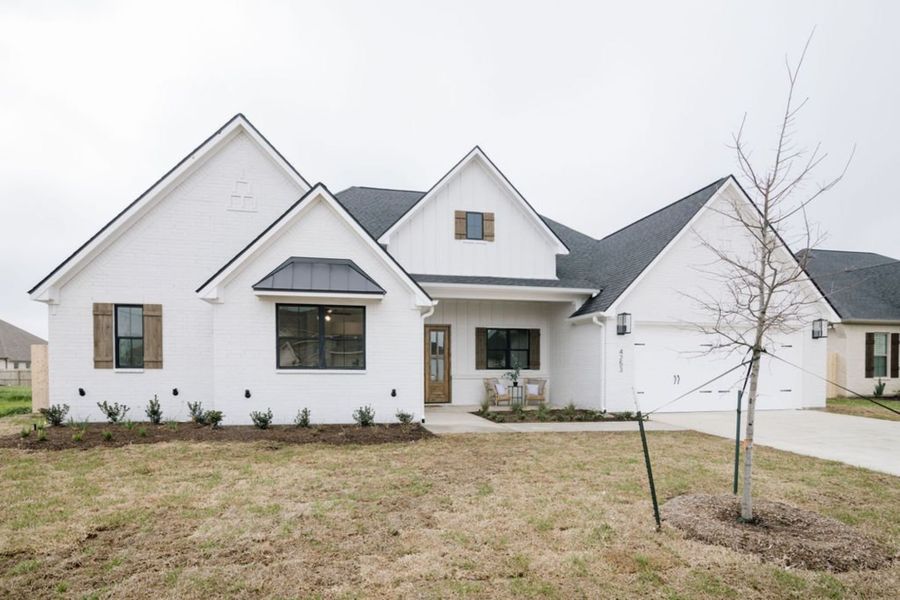Representative exterior photo of a completed home built from the The Sophie by Reece Homes in Stella Ranch, Bryan, TX (Image 2).