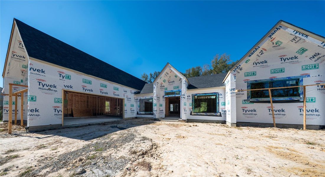 Front elevation with oversized side load garage Front elevation with oversized side load garage