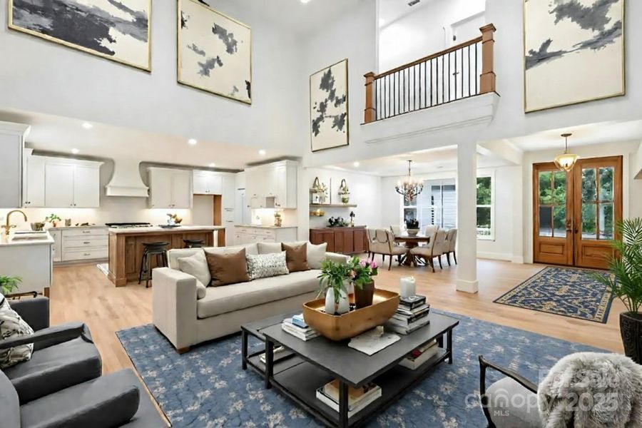 Living room looking towards foyer and dining room (virtually staged) Living room looking towards foyer and dining room (virtually staged)