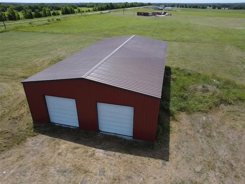 Front exterior of a new home in , Lone Oak, TX, highlighting curb appeal (Image 1). Front exterior of a new home in , Lone Oak, TX, highlighting curb appeal (Image 1).