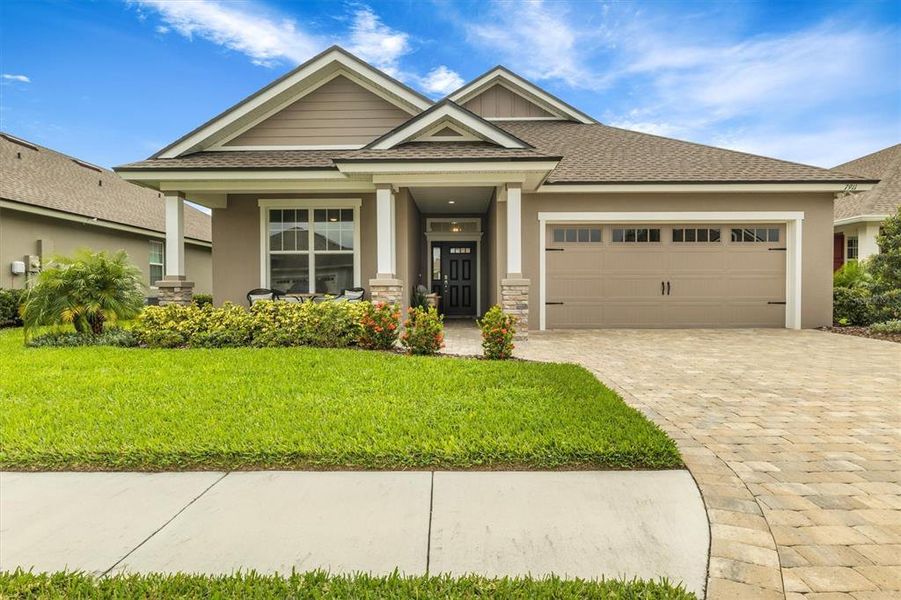 Front exterior of a new home in , Lakeland, FL, highlighting curb appeal (Image 23).