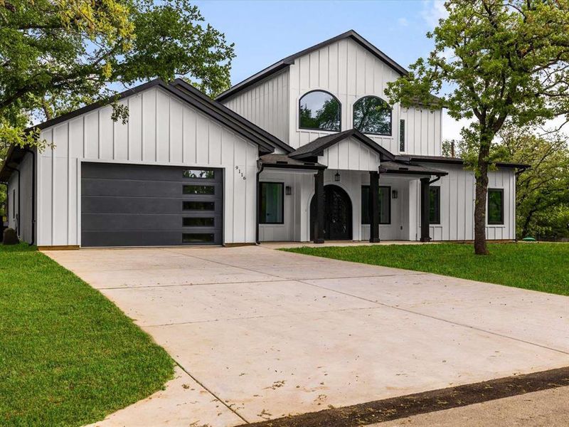 Front exterior of a new home in , Flower Mound, TX, highlighting curb appeal (Image 22). Front exterior of a new home in , Flower Mound, TX, highlighting curb appeal (Image 22).