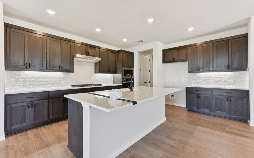 Furnished interior view inside a new home in Kissing Tree, San Marcos (Image 5).