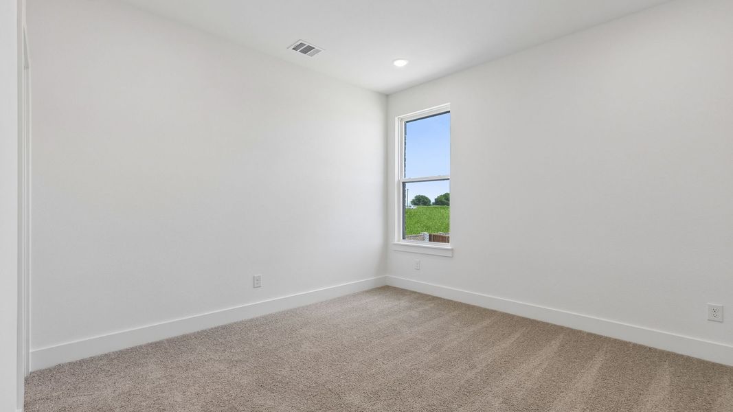 Representative unfurnished interior of a home built from the Custom II by Southgate Homes in Prosper Ridge, Prosper (Image 22).