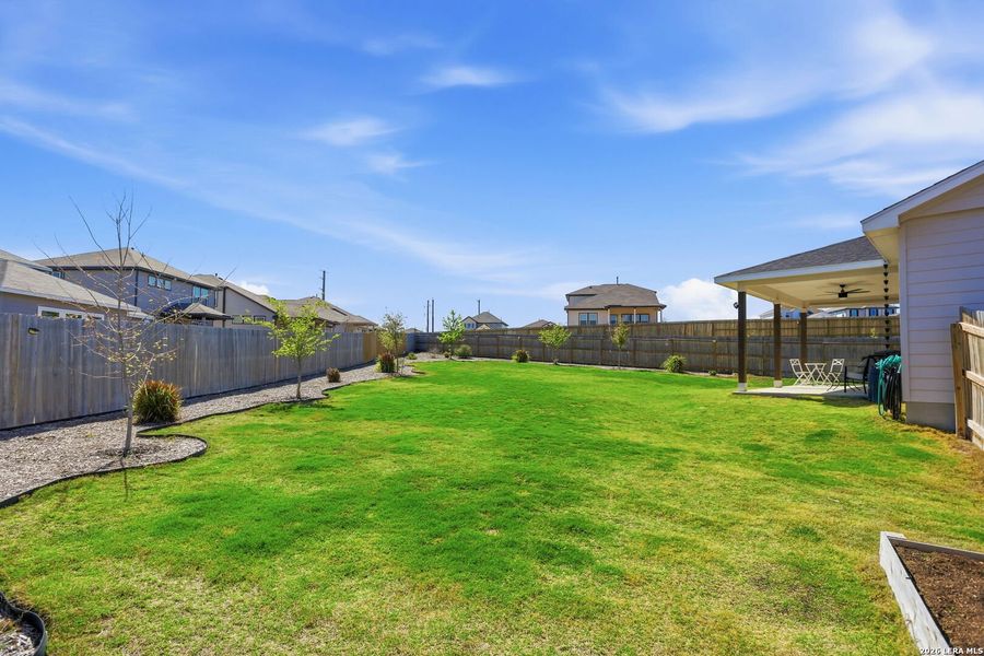 Exterior details and patio area of a home in Hunter's Ranch, San Antonio (Image 28).