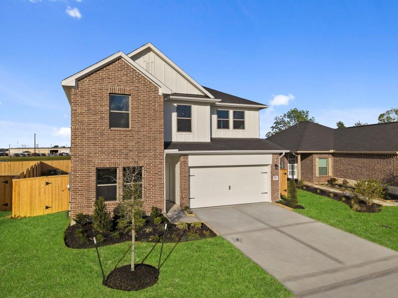 Front exterior of a new home in Laurel Landing, Alvin, TX, highlighting curb appeal (Image 21).