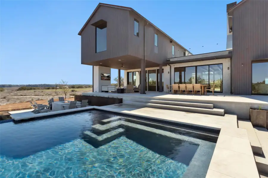 Front exterior of a new home in , Spicewood, TX, highlighting curb appeal (Image 1).