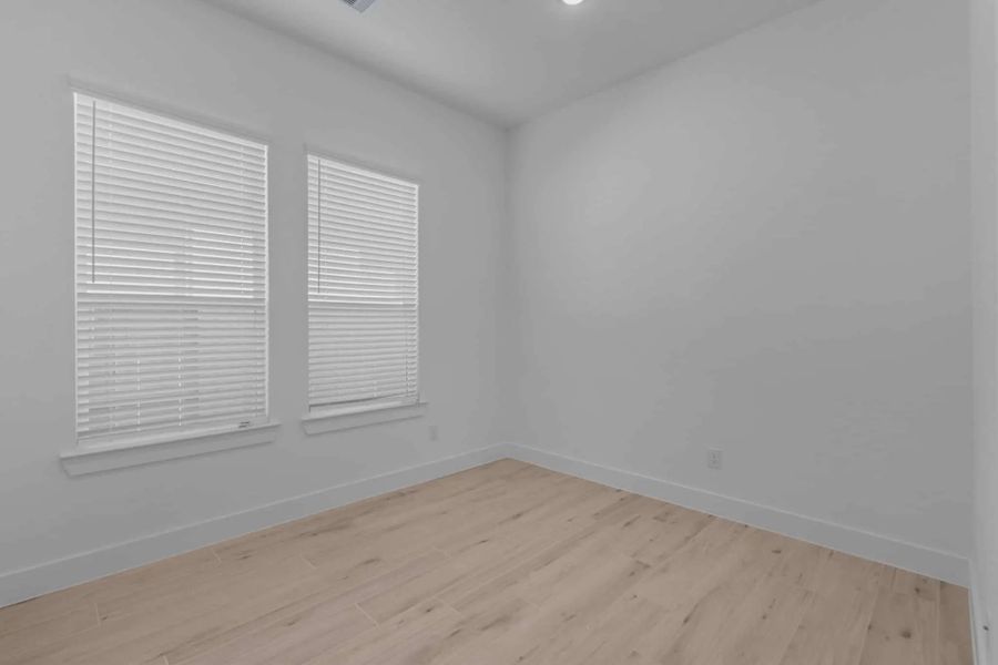 Representative unfurnished interior of a home built from the Lakeway by Chesmar Homes in Meridiana 50's, Manvel (Image 44).