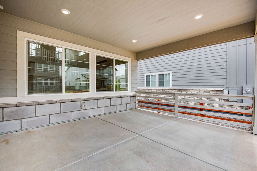 Exterior details and patio area of a home in The Aurora Highlands, Aurora (Image 4). Exterior details and patio area of a home in The Aurora Highlands, Aurora (Image 4).