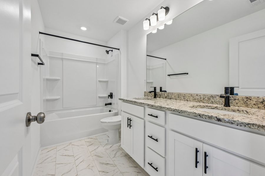 Furnished interior view inside a new home in Forestville Station, Wake Forest (Image 9).