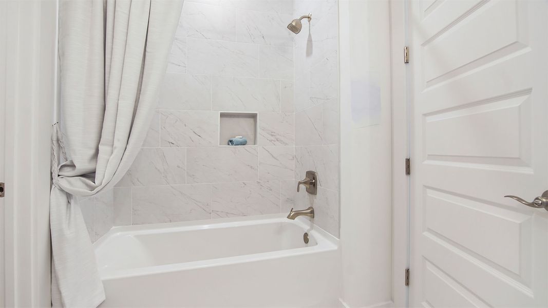 Representative furnished interior of a home built from the Brayden by D.R. Horton in Parkside, Santa Rosa Beach (Image 38).