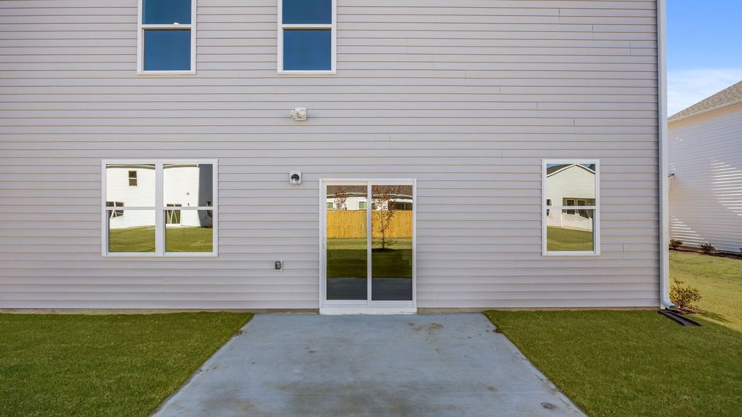 Exterior details and patio area of a home in West New Bern, New Bern (Image 22).