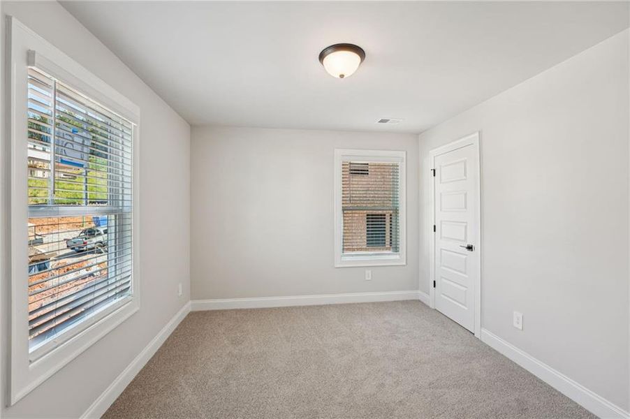 Spacious, unfurnished interior of a new home in Hemingway - Reserve Series, Cumming (Image 41). Spacious, unfurnished interior of a new home in Hemingway - Reserve Series, Cumming (Image 41).