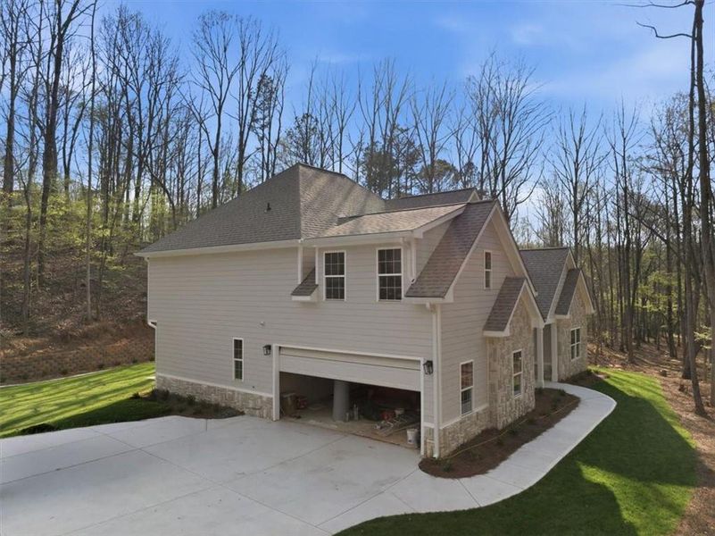 Front exterior of a new home in , Villa Rica, GA, highlighting curb appeal (Image 18).