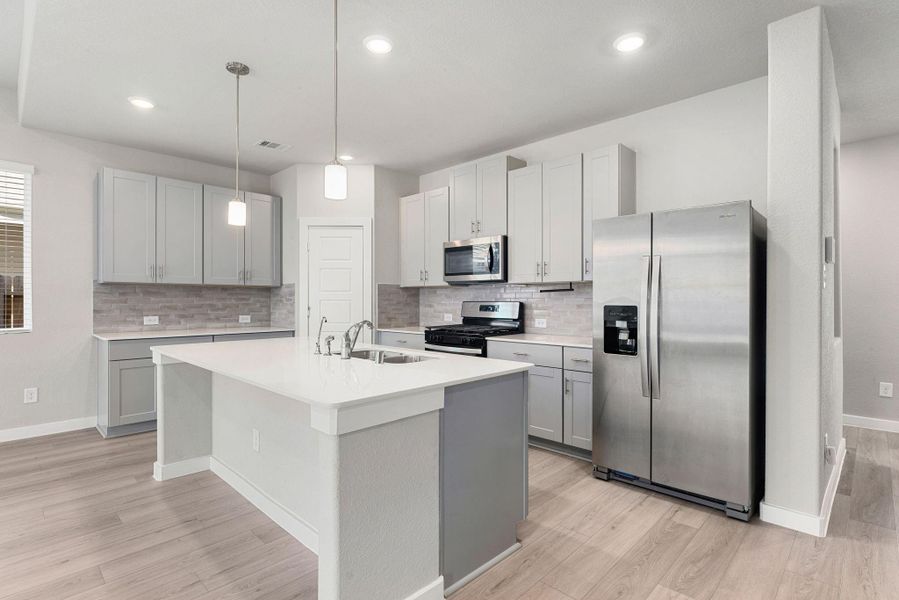 Furnished interior view inside a new home in Sundance Cove - Premier Series, Crosby (Image 11).