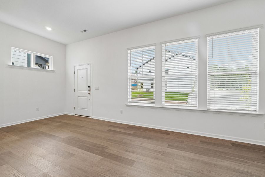 Spacious, unfurnished interior of a new home in Terraces at the Exchange, Indian Land (Image 12).
