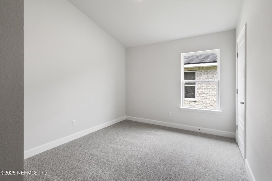 Spacious, unfurnished interior of a new home in Shadow Crest at Rolling Hills, Green Cove Springs (Image 11).