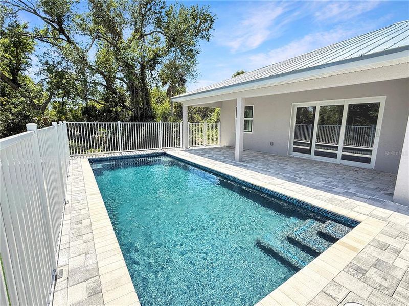 Exterior details and patio area of a home in , Port Charlotte (Image 17).