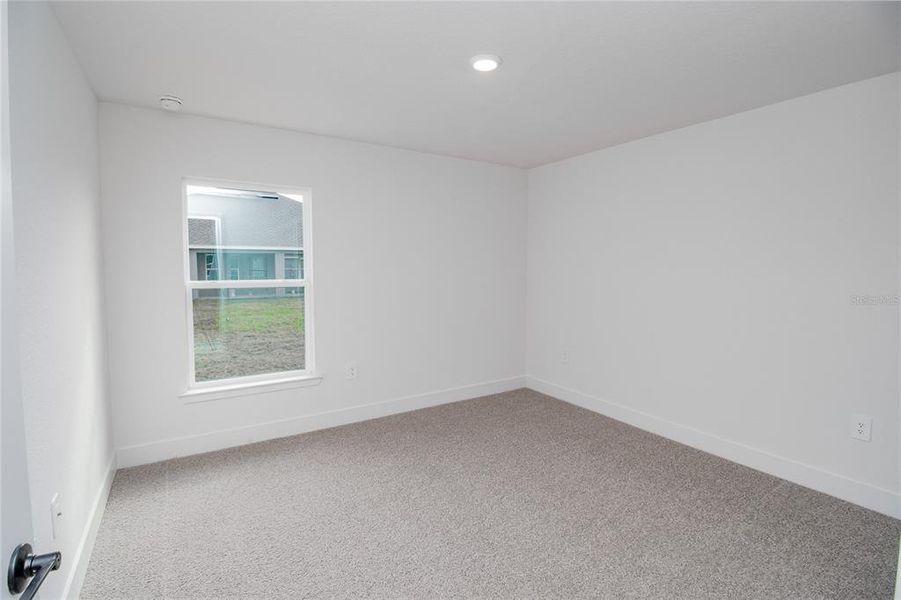 Spacious, unfurnished interior of a new home in Hickory Ridge Estates, Lake Wales (Image 26).