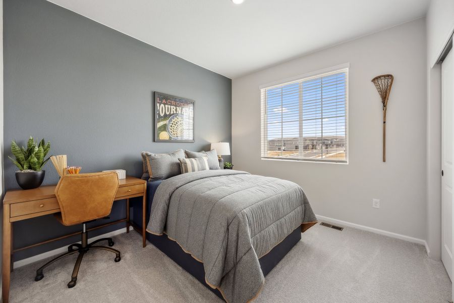 Representative furnished interior of a home built from the 2503 by Risewell Homes in Harvest Crossing, Aurora (Image 26).