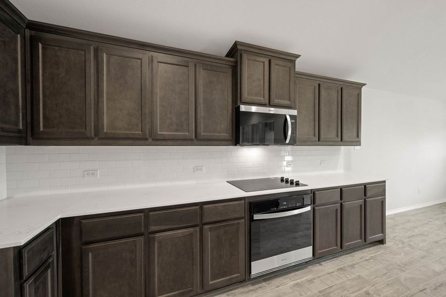 Front exterior of a new home in Mountain Valley, Burleson, TX, highlighting curb appeal (Image 7).