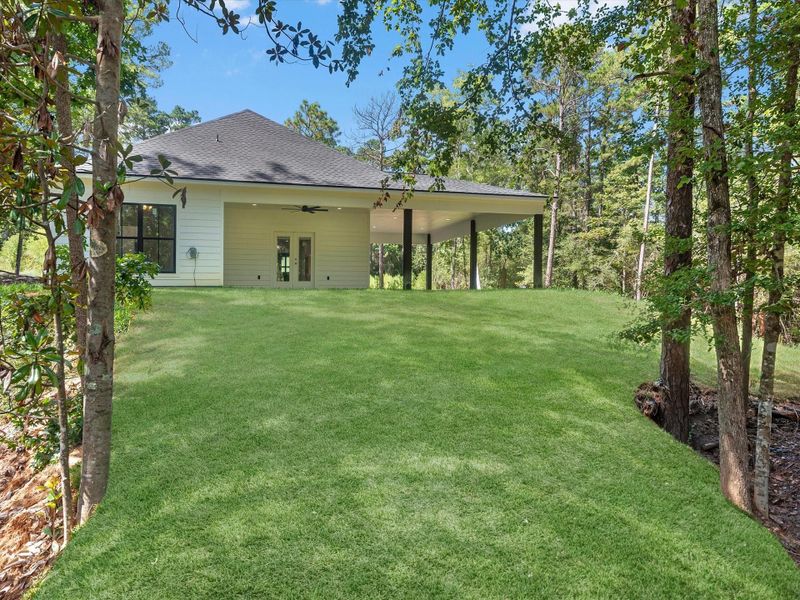 Such a unique backyard setting! Direct golf cart access