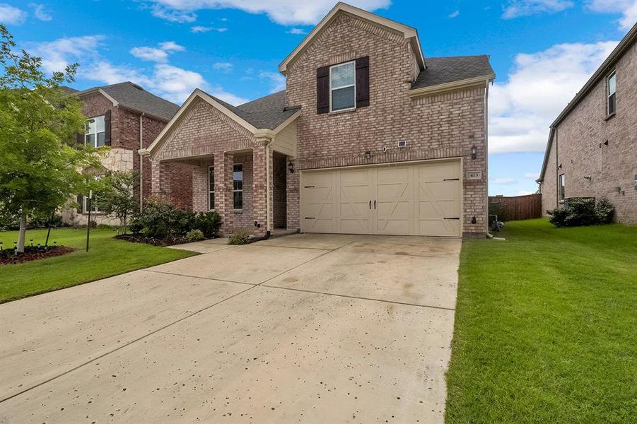 Front exterior of a new home in , Little Elm, TX, highlighting curb appeal (Image 2). Front exterior of a new home in , Little Elm, TX, highlighting curb appeal (Image 2).