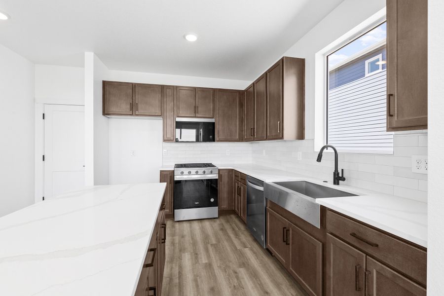 Representative furnished interior of a home built from the Bloom Series - Violet by Brightland Homes in Granary, Johnstown (Image 17). Representative furnished interior of a home built from the Bloom Series - Violet by Brightland Homes in Granary, Johnstown (Image 17).