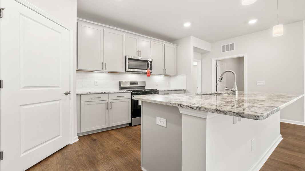 Furnished interior view inside a new home in The Villas at Kinsley, Jamestown (Image 7). Furnished interior view inside a new home in The Villas at Kinsley, Jamestown (Image 7).