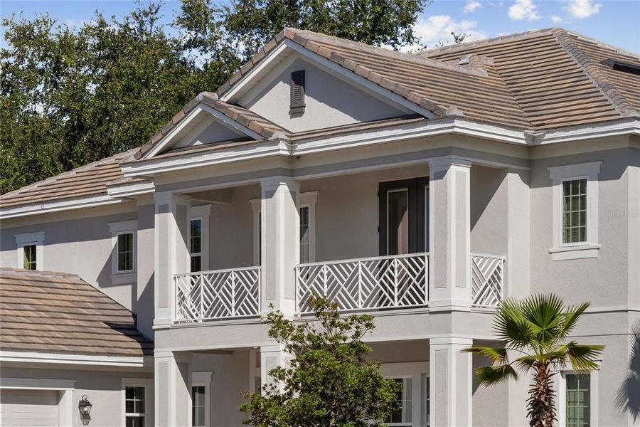 Front exterior of a new home in Fire Creek, Gotha, FL, highlighting curb appeal (Image 2). Front exterior of a new home in Fire Creek, Gotha, FL, highlighting curb appeal (Image 2).