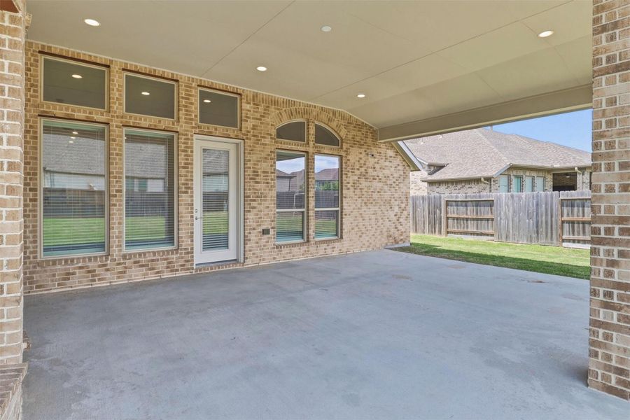 Extended covered patio measures 25 x 20.  Great space to retreat from the Texas heat. Add an outdoor kitchen and this place will be the place to be.