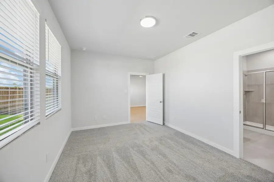 Primary Bedroom in the Birch home plan by Trophy Signature Homes – REPRESENTATIVE PHOTO Primary Bedroom in the Birch home plan by Trophy Signature Homes – REPRESENTATIVE PHOTO