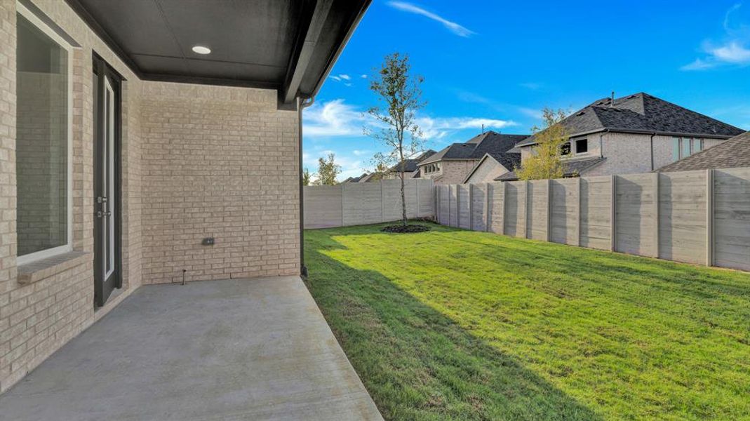 View of yard featuring a patio