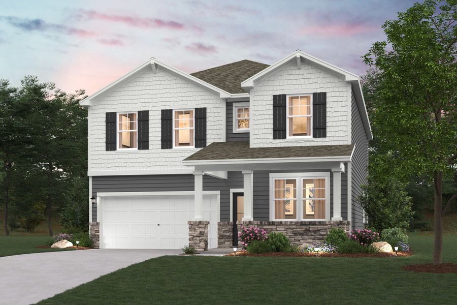 A house with a large front yard with Graceland in the background.