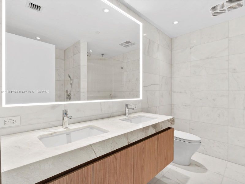 Furnished interior view inside a new home in Five Park, Miami Beach (Image 12).